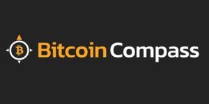 logo robota bitcoin compass litera b w kole pomarańczowo biały napis na czarnym tle