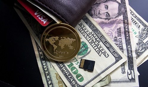 portfel pieniądze kryptowaluta ripple wallet sprzętowy biurko